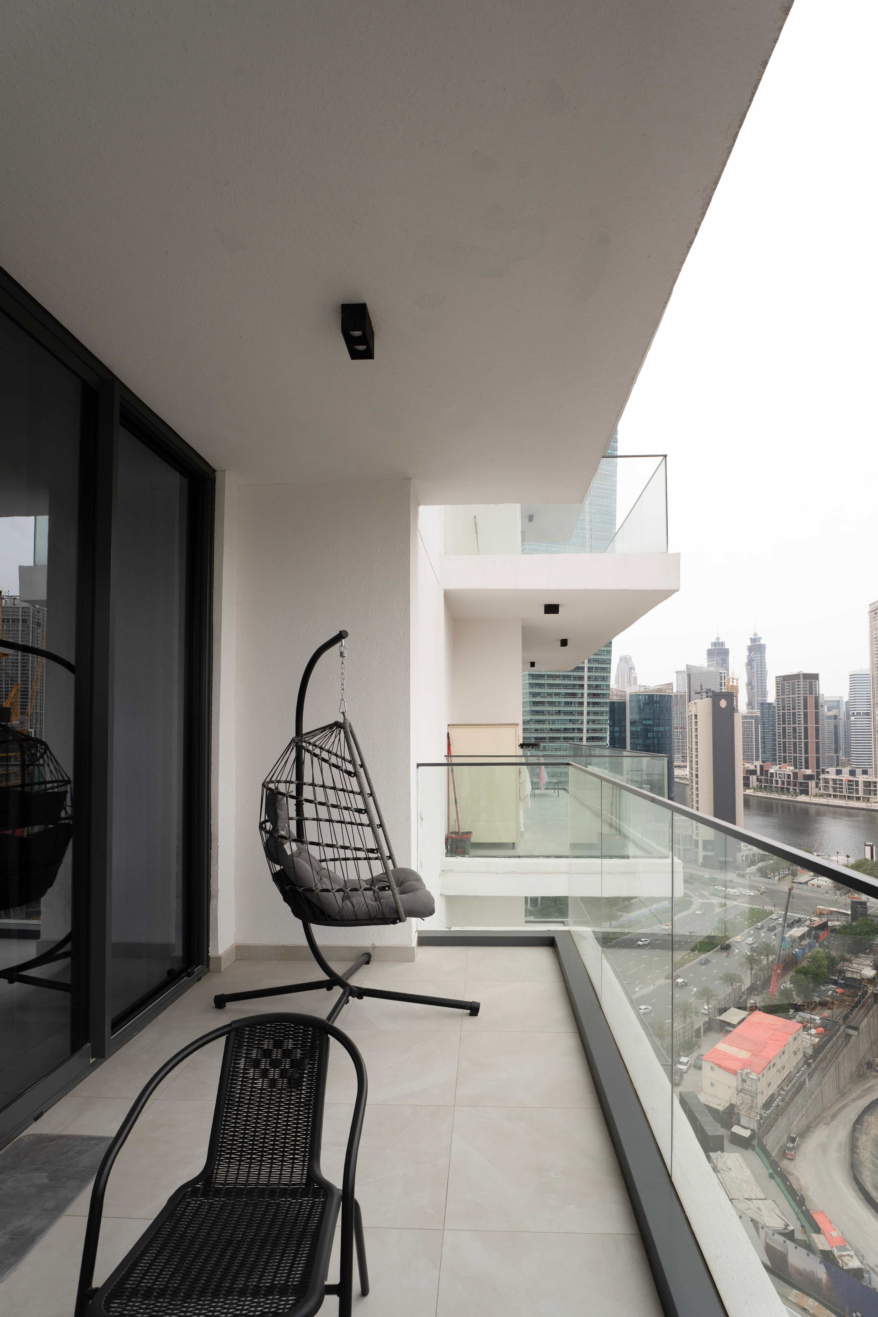 Rentico | Burj View 1BR Apt | Balcony & Foosball — photo 17